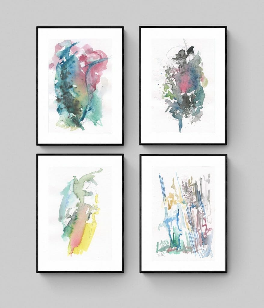 four paintings on a wall